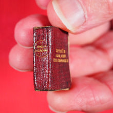 Load image into Gallery viewer, Smallest English Dictionary in the World. >>MINIATURE BRYCE DICTIONARY IN LOCKET<< Publication Date: 1900 CONDITION: GOOD