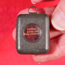 Load image into Gallery viewer, Smallest English Dictionary in the World. &gt;&gt;MINIATURE BRYCE DICTIONARY IN LOCKET&lt;&lt; Publication Date: 1900 CONDITION: GOOD
