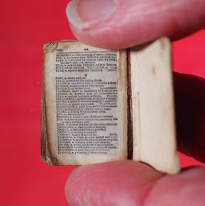 Smallest English Dictionary in the World. >>MINIATURE BRYCE DICTIONARY IN LOCKET<< Publication Date: 1900 CONDITION: GOOD