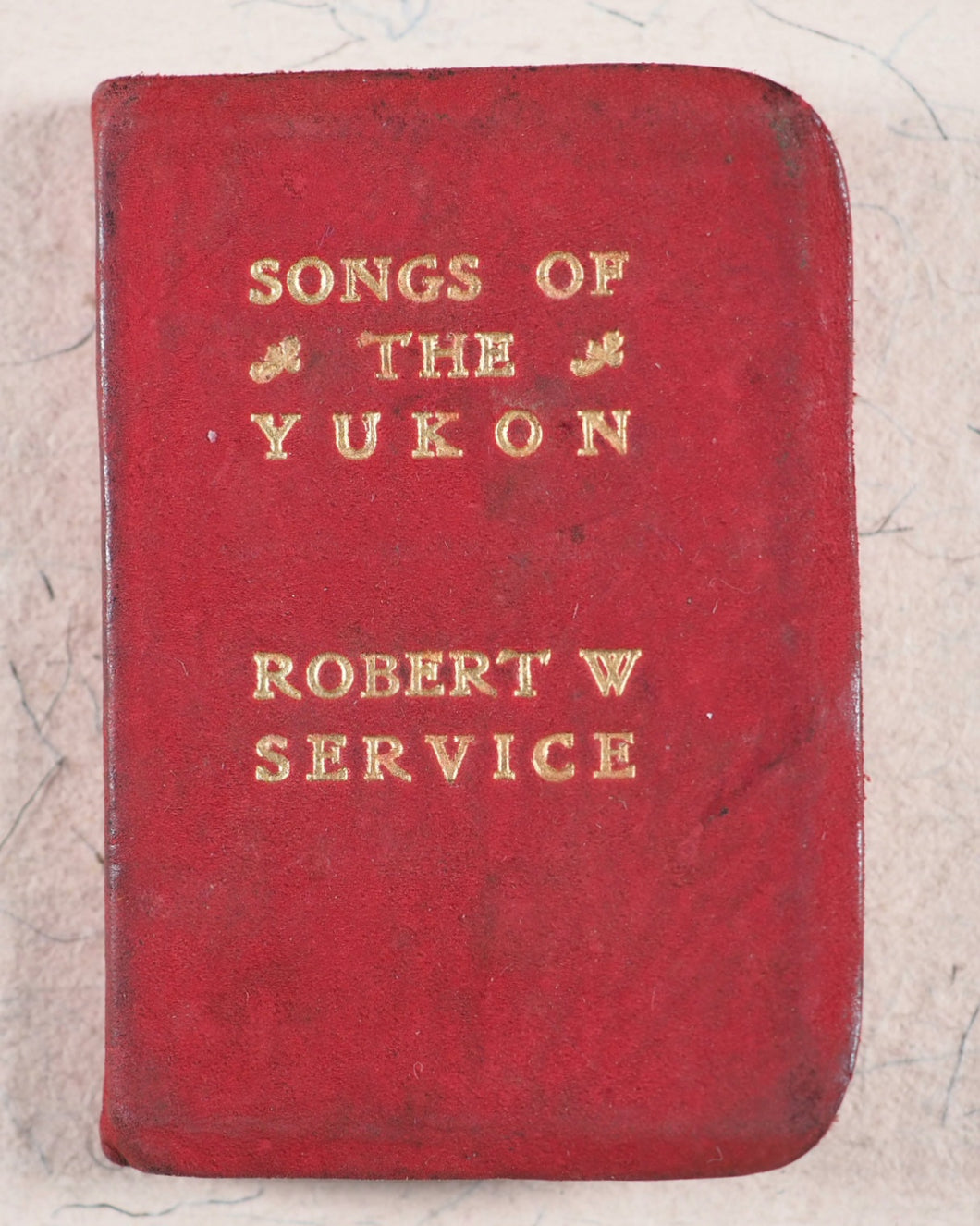 Service, Robert W. Songs of the Yukon. Briggs, William. Toronto. 1913.