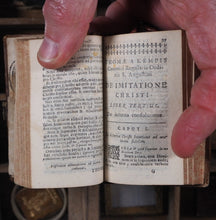 Load image into Gallery viewer, Imitation of Christ. Thomae a Kempis canonici regularis ordinis S.Augustini De Imitatione Christi Libri Quatuor recensiti ad finem autographi anni 1441. THOMAS A KEMPIS Publication Date: 1740 CONDITION: VERY GOOD [MINIATURE BOOK-Imitation of Christ]
